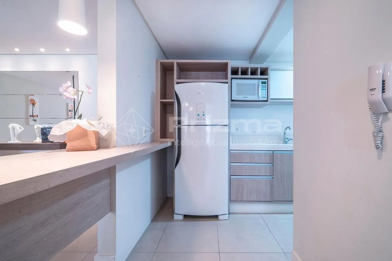 Boulevard 123: Elegant 3-Bedroom Apartment with Heated Pool in Central Bombinhas Beach