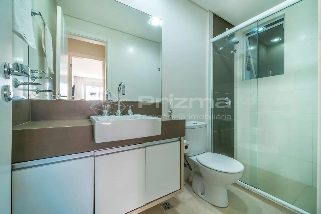 Boulevard 123 D - Apartamento com 3 dormitórios em elegante condomínio com piscina aquecida na praia do centro de Bombinhas